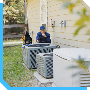 Man on a bench beside a home AC unit, illustrating cooling system tune‑up in Duluth, GA.